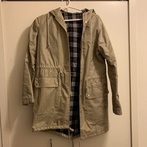 Tan American Apparel rain coat with plaid lining
